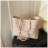 Large-capacity tote bag niche design simple hollow bag women's summer new versatile shoulder bag