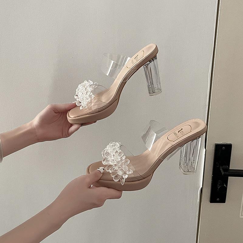 

Niche high-end rhinestone flower transparent high-heeled sandals women s 2025 summer shoes French crystal thick-heeled cool slippers 34