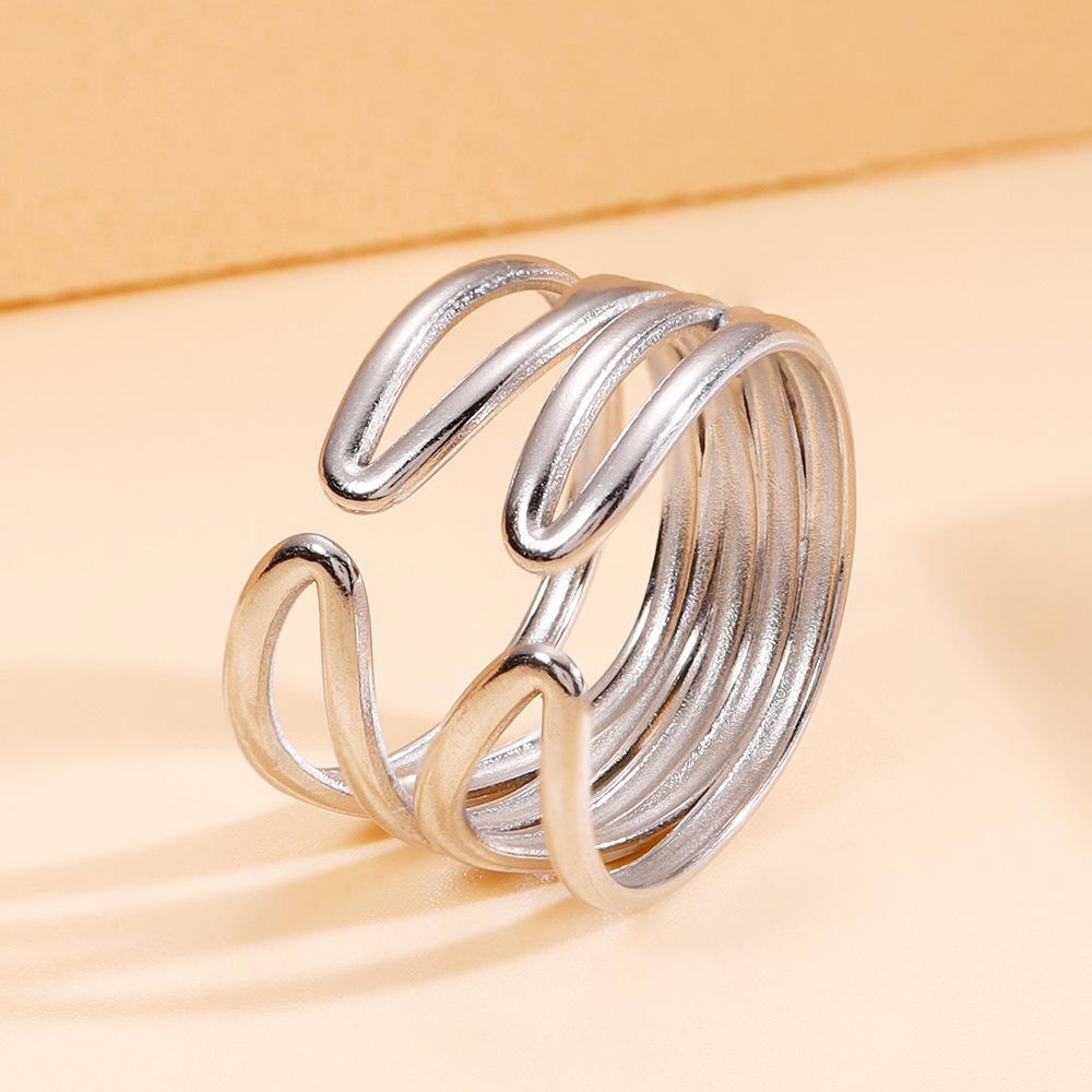 Elegant Adjustable Stainless Steel Ring: Geometric Hollow Design, Vacuum Gold Plating, Women s Jewelry