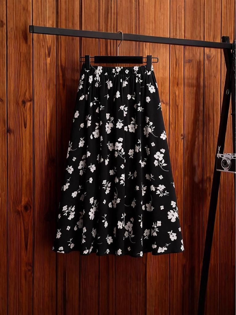 Women's Black Floral A-Line Midi Skirt: Versatile Spring/Autumn Fashion Trend.