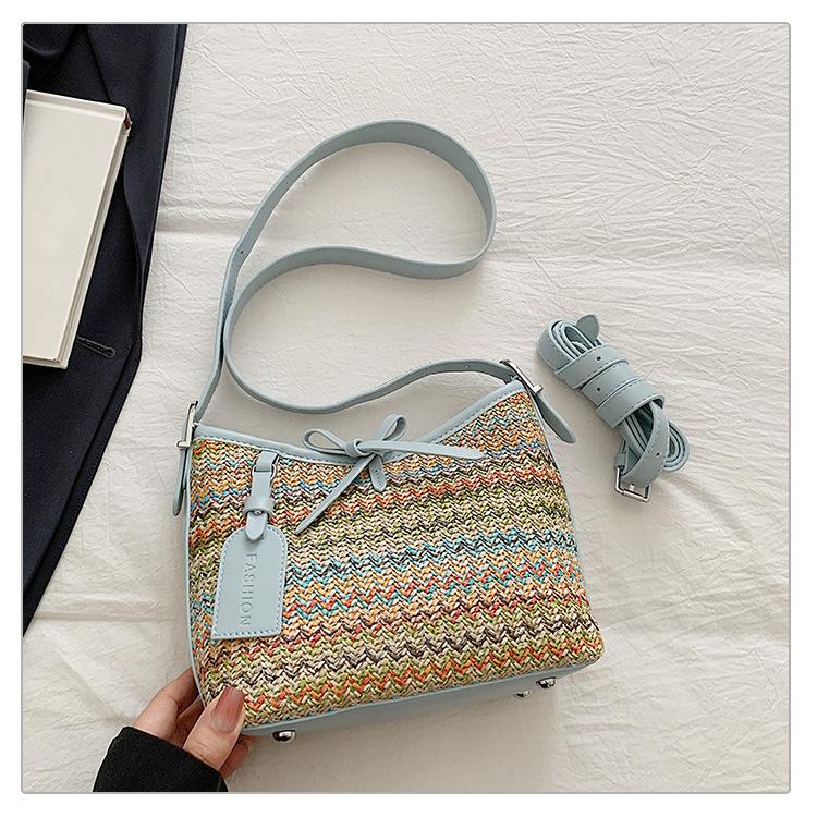 

Summer straw beach bag 2025 new seaside vacation handbag simple striped bucket bag woven messenger bag синій