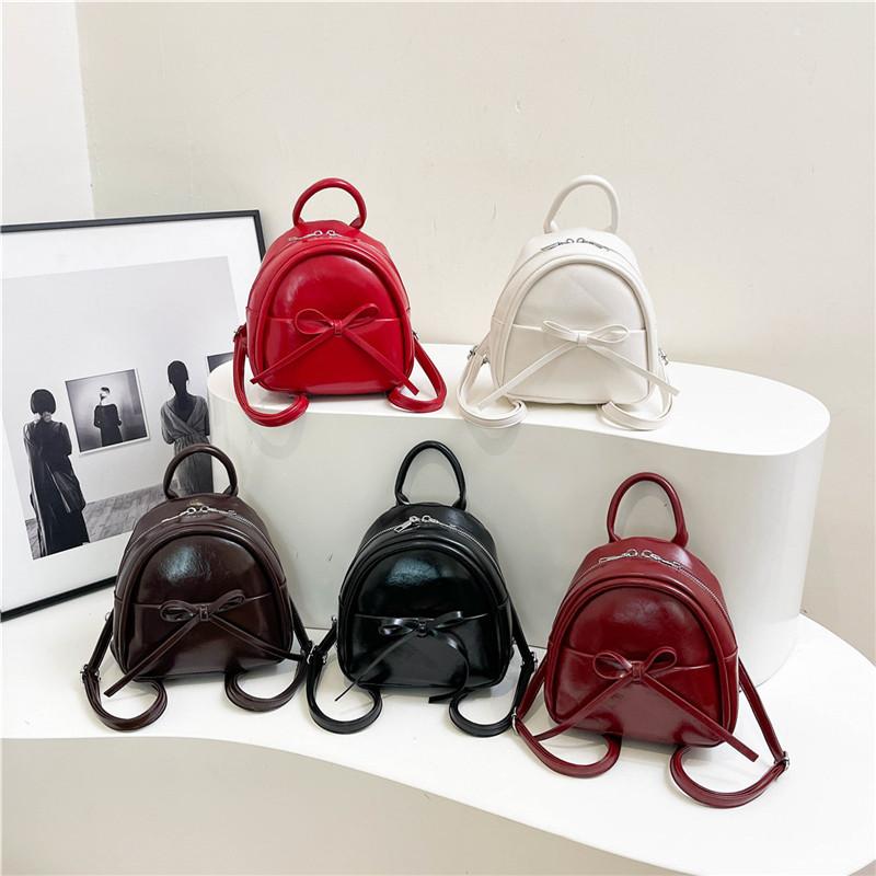 Cute Bow Solid Zipper  Pu Backpack Women'S Simple Waterproof Bag Large Capacity Travel Backpack Girly Student School Bags