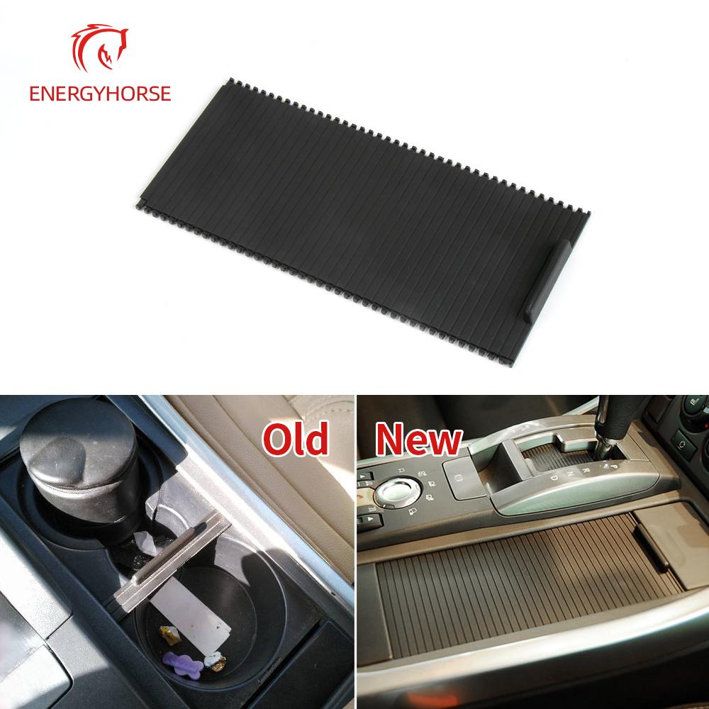 Copertura Porta Bevande Console Centrale Auto Tapparella a Rullo Scorrevole FHM500032 Per Land Rover Range Rover Sport 2005-2009