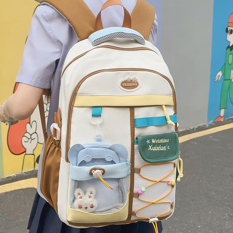 Japanese new high-value, fresh and sweet contrasting colors splicing junior high school students backpack women's lightweight backpack