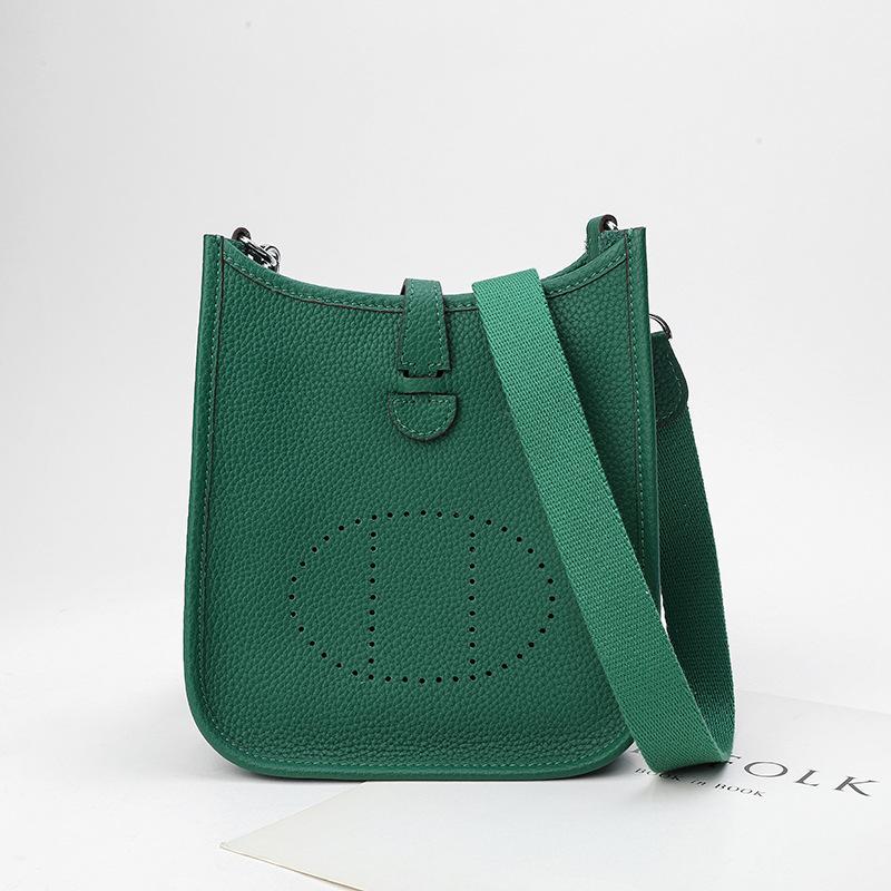 Factory wholesale first layer togo cowhide bucket bag women's bag lychee pattern hollow single shoulder crossbody bag hollow design