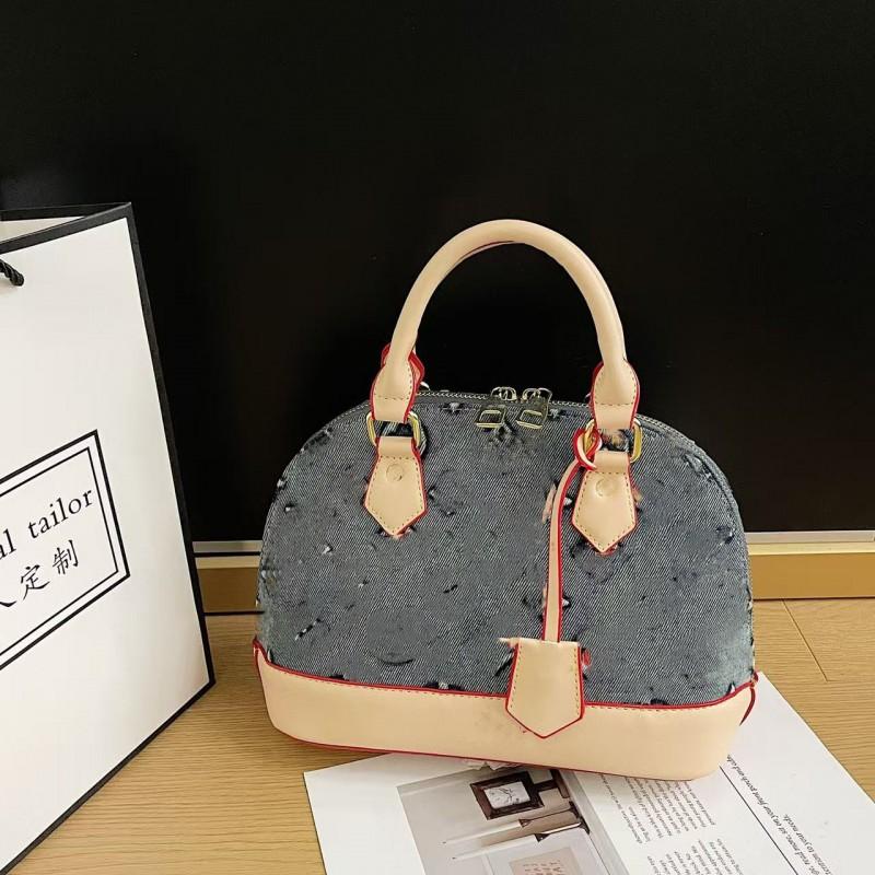 2026 Stilvolle Muschel-Handtasche Damen PU-Leder Umhängetasche Kleine Größe Retro-Design Mit Reißverschluss