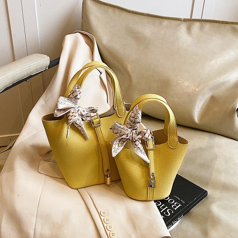 

Niche Портативная сумка-ведро Женская популярная сумка-мессенджер Универсальная сумка через плечо Small жёлтый