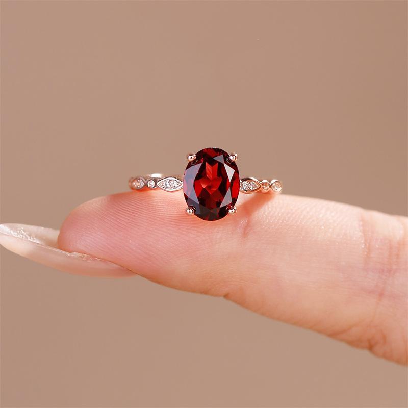 

Set With 2 Carat Egg-Shaped Imitation Natural Garnet Ring, Rose Gold Plated Live Ring. Opening Adjustable