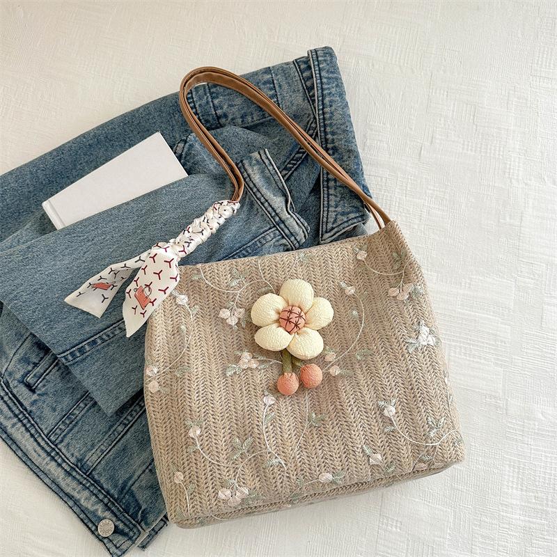 Niche Knitted Bucket Bag New Style Class Commuter Tote Bag for Women Large Capacity Vacation One Shoulder Straw Woven Bag