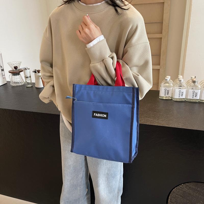 Hand Carry Office Workers Lunch Box Bag Waterproof 2025 Autumn Niche Design Foreign Style Casual Fashion Solid Color Handbag