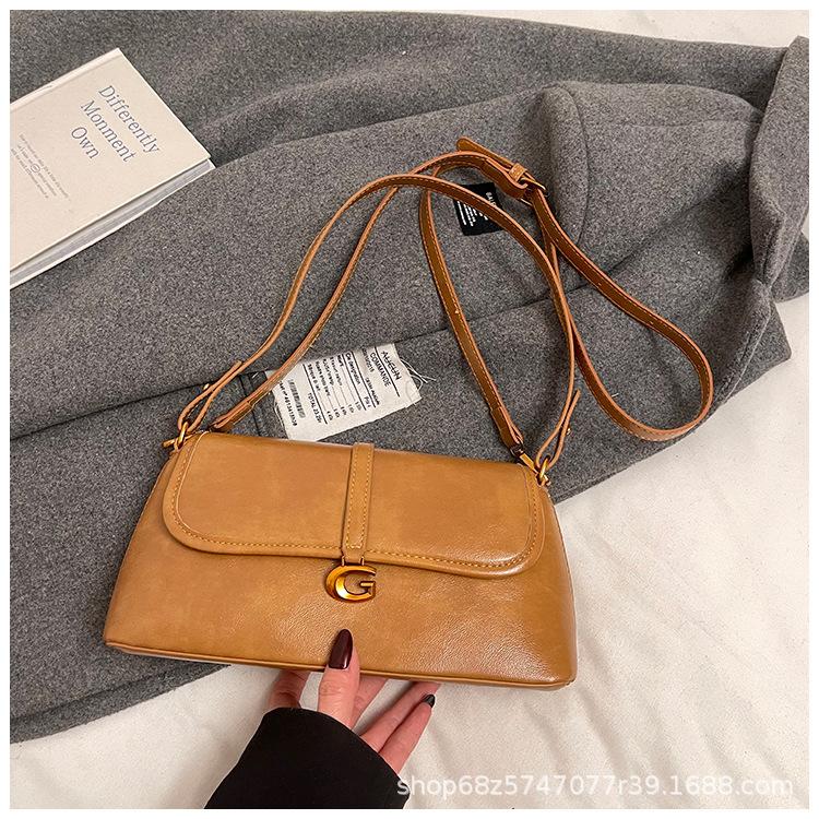 Retro soft leather shoulder armpit bag women's 2025 new versatile fashion handbag casual baguette bag