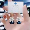 Fashion Geometric Bow Flower Pearl Earrings Women'S Premium Versatile Small Fragrant Wind Earrings