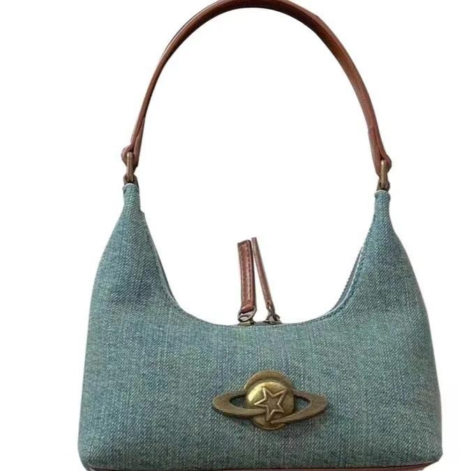 Nova bolsa de axila outono/inverno Bolsa de ombro Wandering Planet Bolsa Joker Bolsa de axila de cowboy de nicho Bolsa de mão