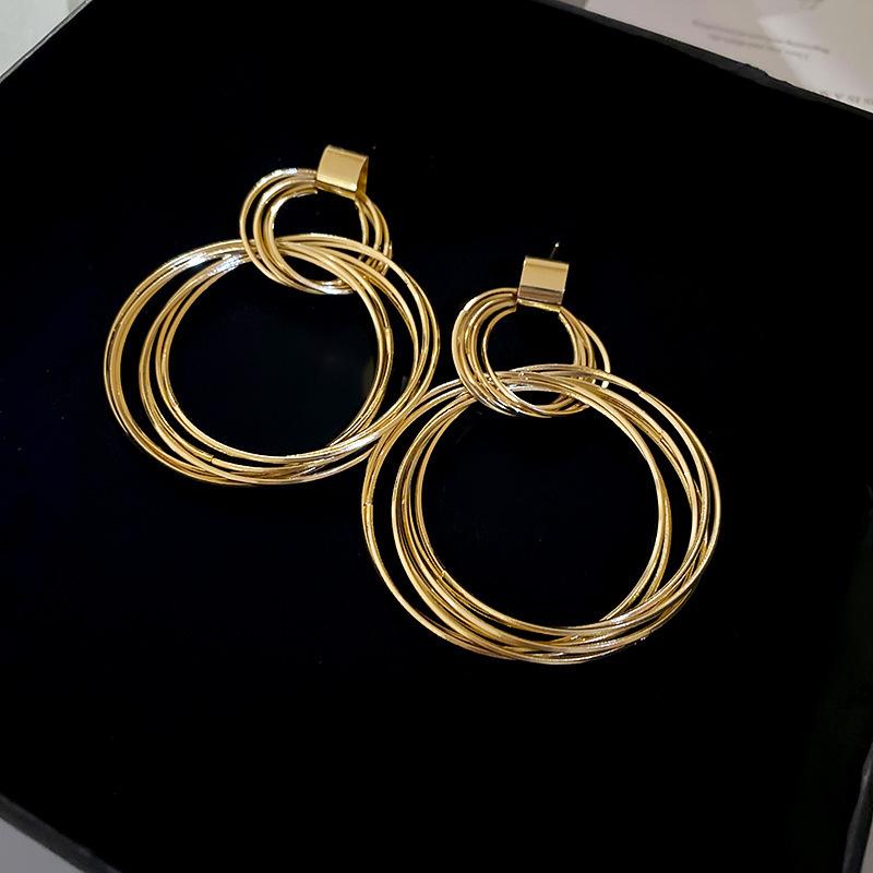 Silver Needle Geometric Openwork Round Pendant Earrings with European and American Exaggerated Style for Women.