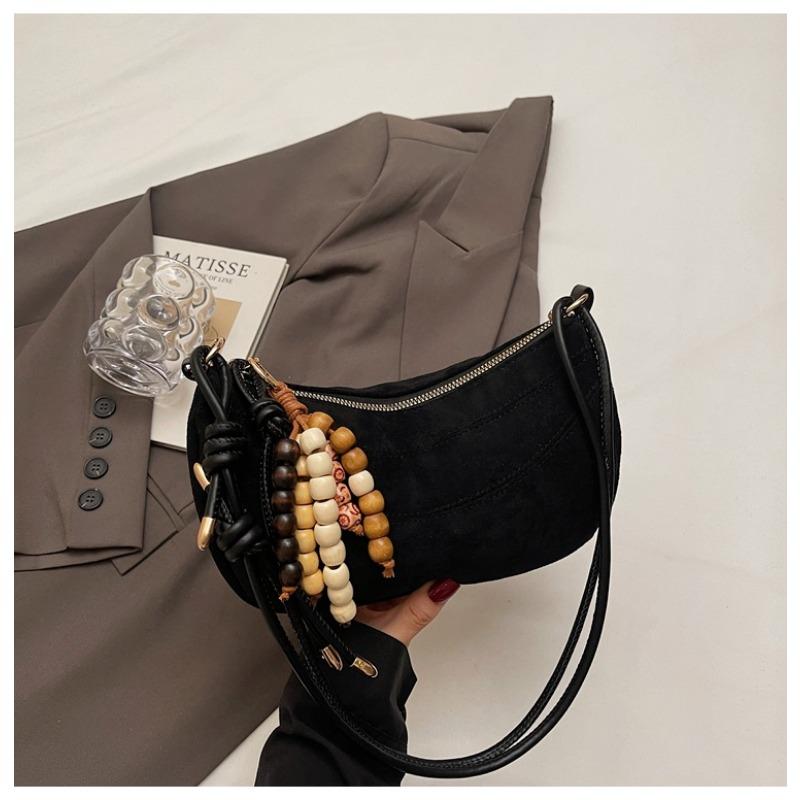 

Niche trend portable dumpling bag women s new summer versatile casual light luxury shoulder messenger bag чорний