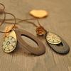 Gioielli da donna vintage con intaglio vuoto, collana in maglione, corda di velluto, legno Waterdrop