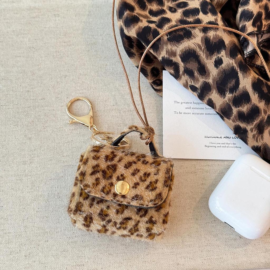 Ciondolo e Collana in Pelle con Stampa Leopardo: Moneta, Auricolare, Custodia per Occhiali e Catena per Maglione – Ornamento di Lusso.