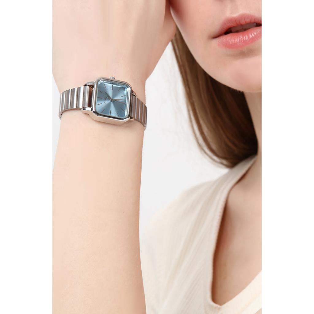 Montre-bracelet pour femme avec bracelet carré argenté et cadran