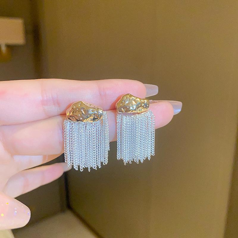 European and American metal wind hollow flower fishtail pearl earrings exaggerated temperament earrings heavy industry earrings