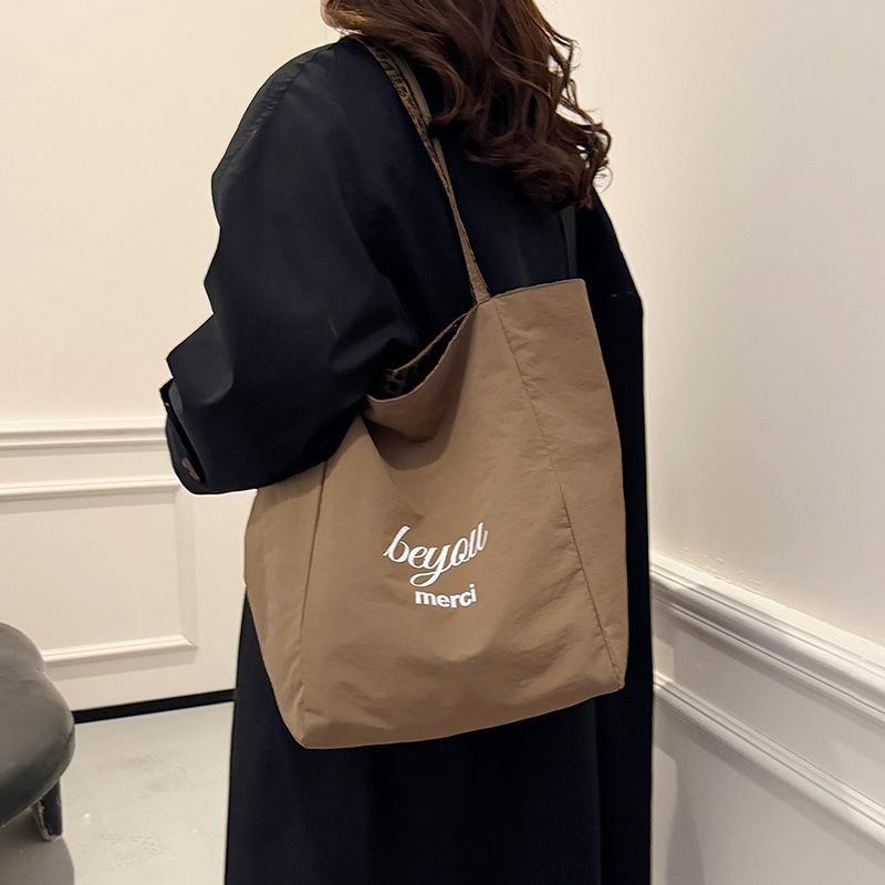Mote leopardtrykk lerretsveske dame 2025 ny trend mote college-stil tote bag avslappet retro skulderveske