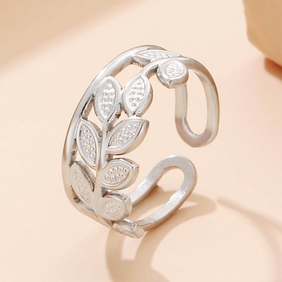 Elegant Hollow Gold-Plated Leaf Open Ring for Women - Fashionable Stainless Steel Jewelry