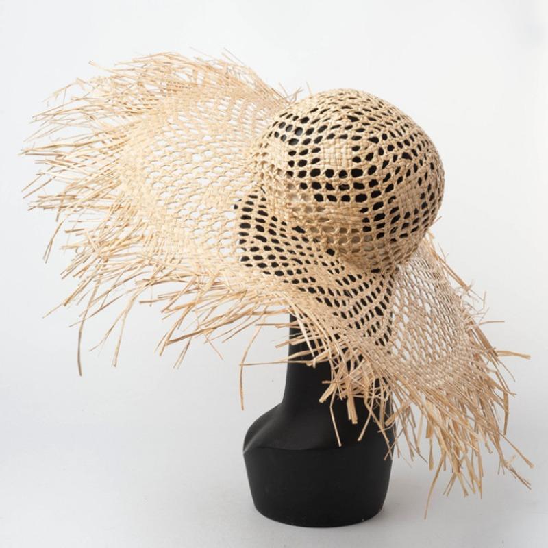 Summer straw hat hollow women's new beach hat photo sun hat women's big brim casual solid color rough edge Lafite straw hat