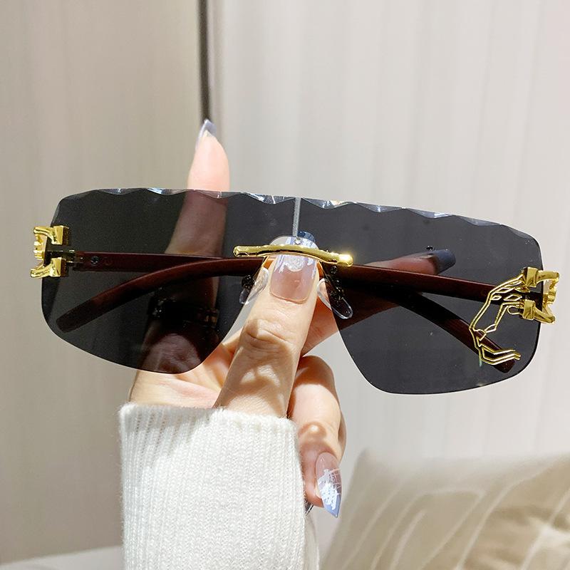 Frameless One-piece Lens Wavy Edge Ladies Personality Irregular Sunglasses