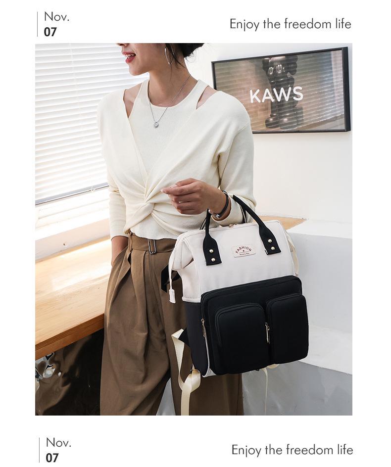 Mama's Multifunctional Backpack: Stylish Diaper Bag with Insulated Compartments & Changing Pad