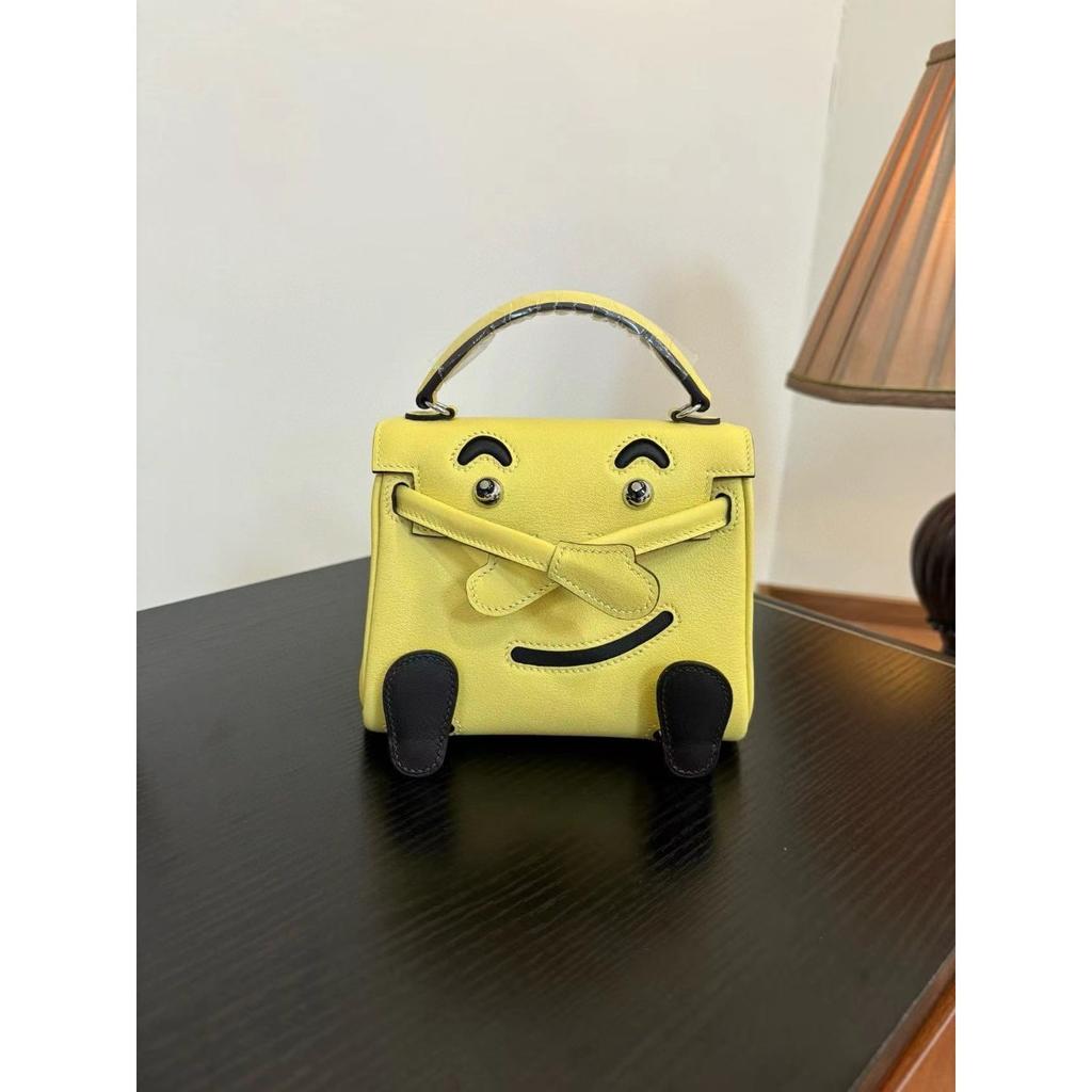 Borsa a faccina sorridente nuova per la primavera e l'estate 2025 borsa Kelli mini in pelle bovina di primo strato di alta gamma borsa a tracolla carina da millenial
