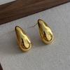 Medieval vintage earrings retro hammer pattern hollow relief gold and silver geometric niche light luxury earrings