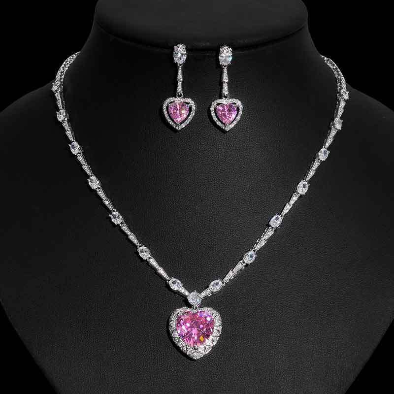 Prominente Mode Pink Love Zirkon Halskette Herzförmiger rosa Diamant Leicht Luxus Anhänger Ohrringe Set Buntes Schatzring Damen
