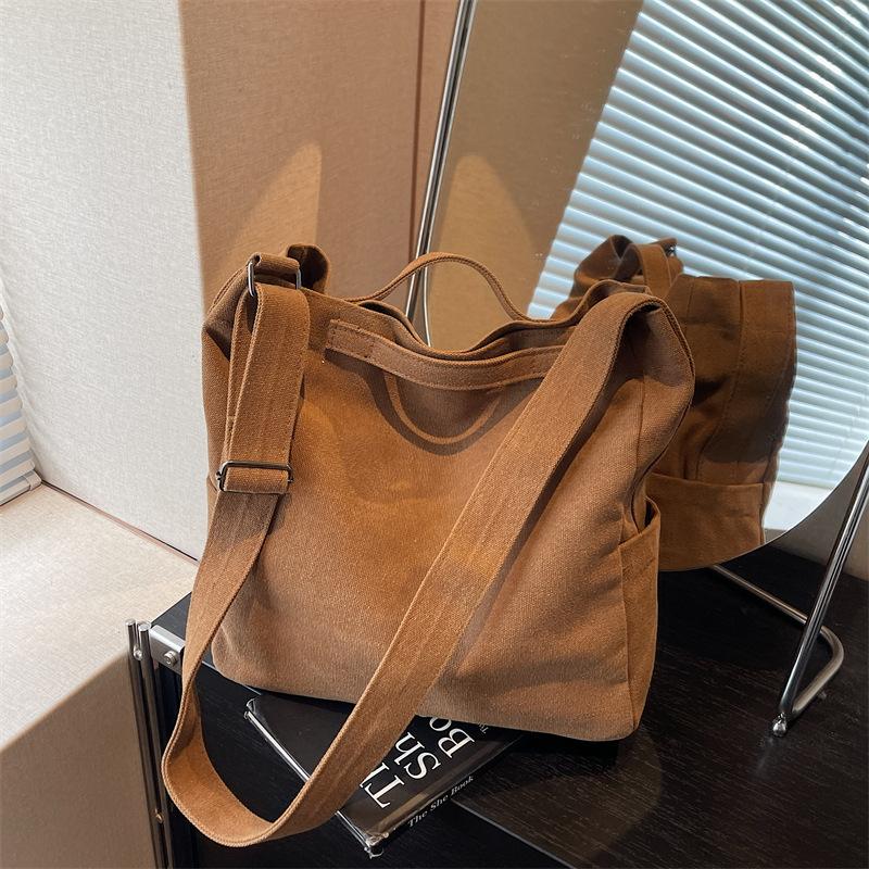 

Повседневная холщовая сумка большой вместимости женская 2025 новая простая сумка-тоут универсальная наплечная сумка-мессенджер доставка одной штукой коричневый