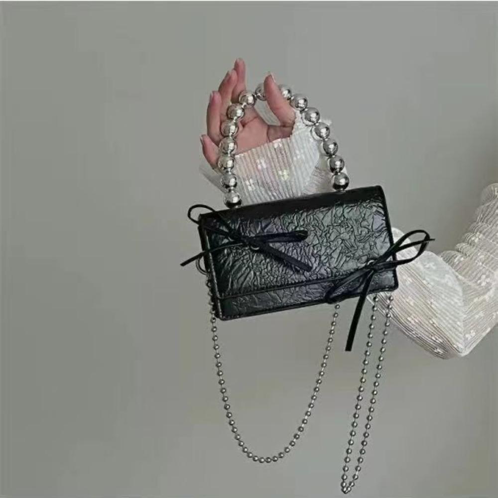 

Niche design fashion bag women s 2025 new mini bow chain mobile phone bag portable shoulder messenger bag