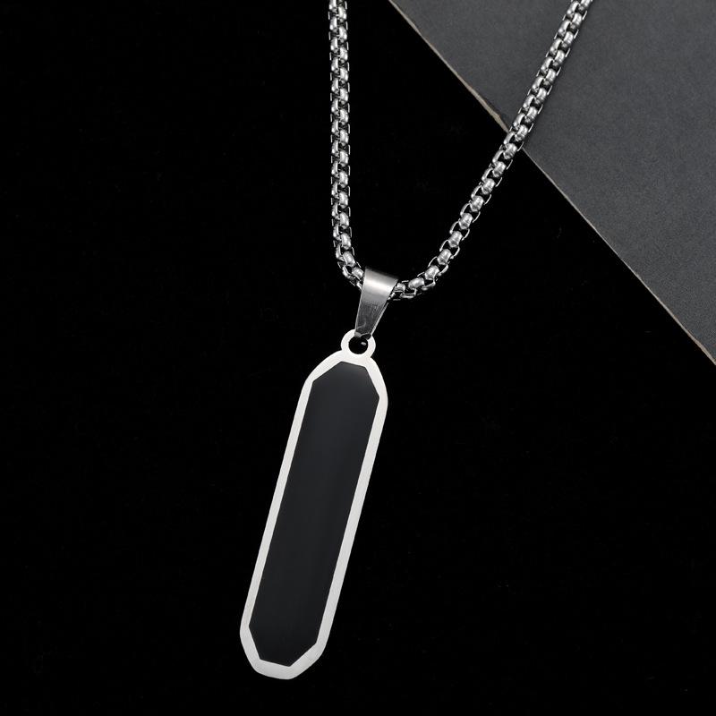 

Минималистичное геометрическое ожерелье из титановой стали с длинной подвеской-планкой из черной эмали