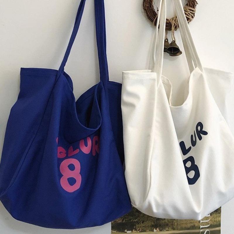 Spring and summer new printed canvas bag women's niche design large-capacity shoulder bag lazy atmosphere tote bag