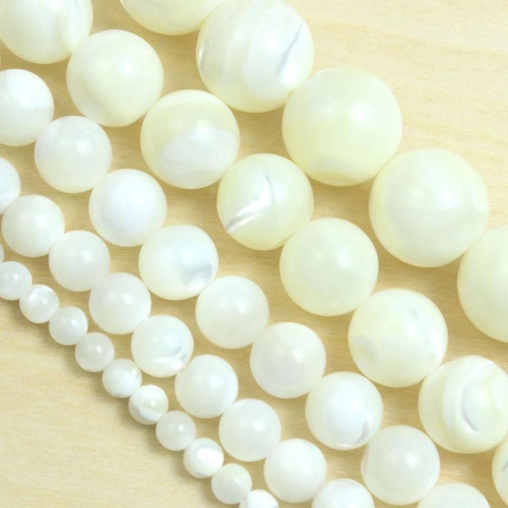 Natural gold and silver silk shell moonlight snail bracelet, Tai Chi pattern cat's eye effect, white disc shell batch, jade mother of pearl bracelet