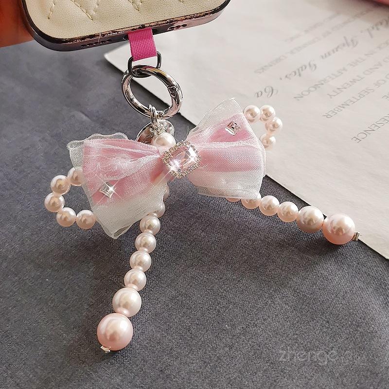Mesh bow pearl bracelet women's ins fashion Xiaoxiangfeng mobile phone pendant mobile phone lanyard short wrist