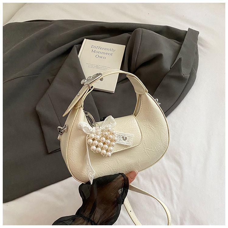 Sense of Hand Crescent Shoulder Bag: 2025 New Niche Design Dumpling-Style Crossbody for Women.