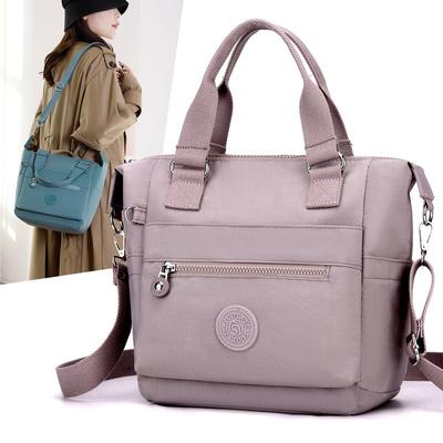 New Women's Bag Shoulder Portable Nylon Bag Large Capacity Messenger Bag Women's Lightweight Multi-pocket Printed Mother Backpack