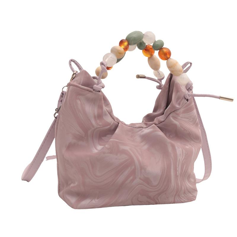 

New Chinese style national style bag women s 2024 summer new foreign style messenger bag Korean version trendy fashion beaded portable bucket bag рожевий