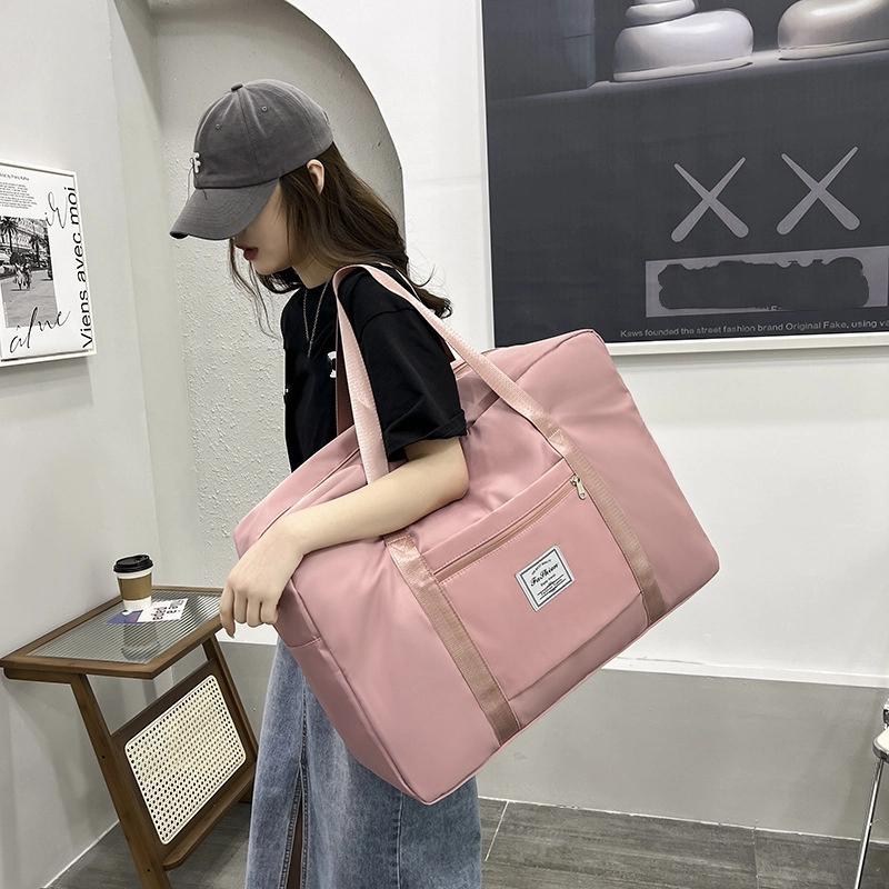 Große Kapazität Tragbare Oxford-Stoff Aufbewahrungstasche Faltbare Gepäcktasche Flugzeugtasche Multifunktionale Reisetasche Umhängetasche