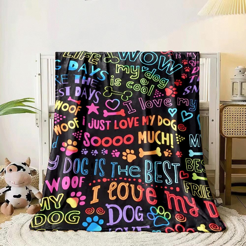 Colorful, dog-themed text, paw prints, hearts, and bones on a black background. for all seasons blanket lunch break throw gift 80cm x 120cm
