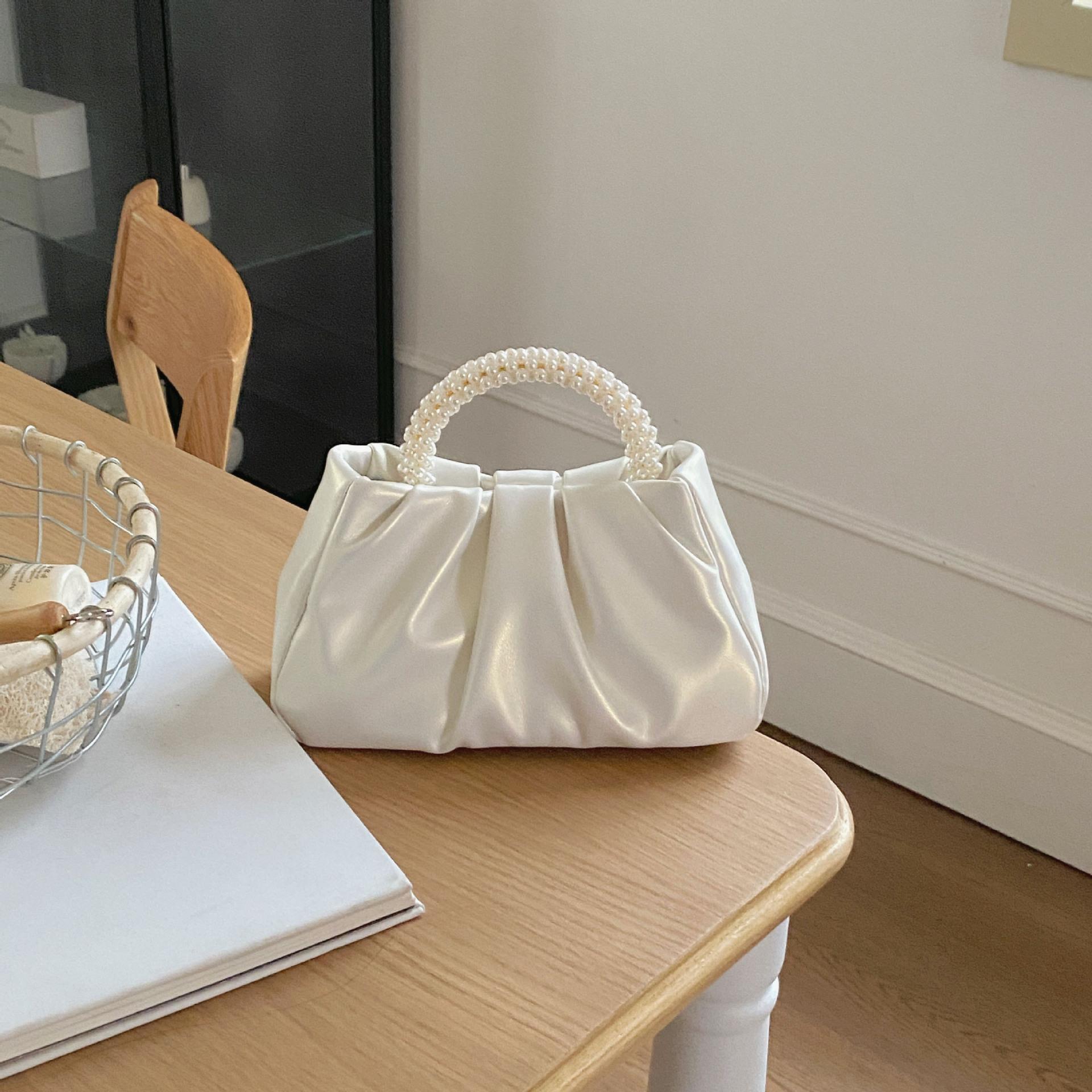 Pearl Wrist Cloud Bag Niche Design Style Temperament High-end Pearl Pure White Pleated Small Size Bag Crossbody Bag Women