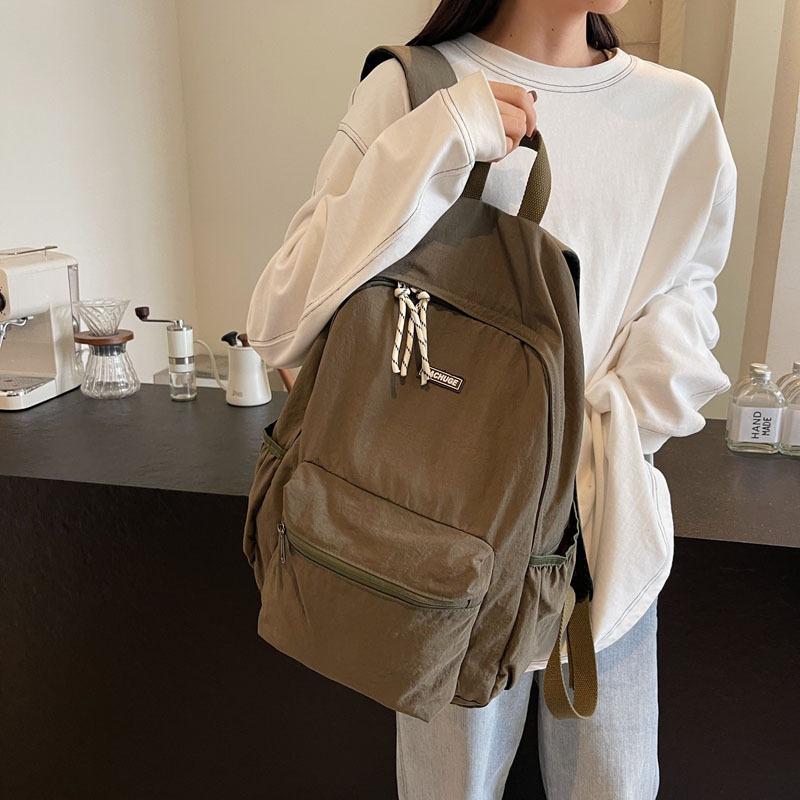Simple and fashionable large-capacity backpack 2025 new leisure niche college class schoolbag women's solid color backpack
