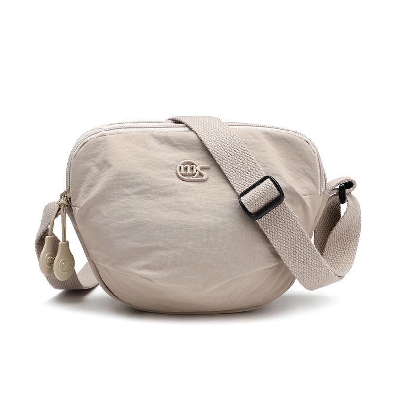 Canvas bag women's summer new fashion niche design messenger bag casual saddle bag