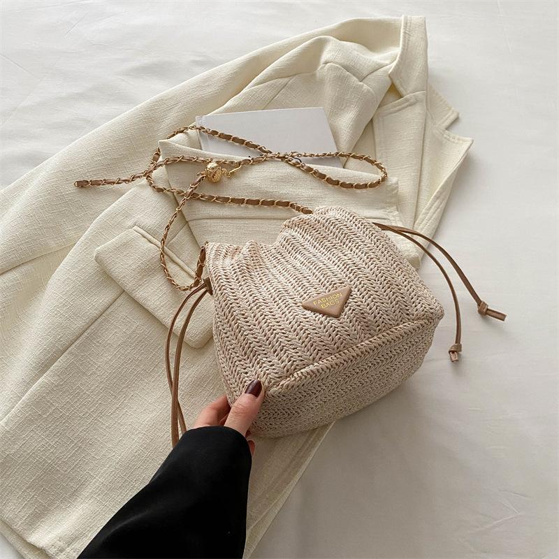 Drawstring fashion Korean version casual bag 2025 spring and summer new foreign style shoulder messenger bag straw bucket bag women's bag tide