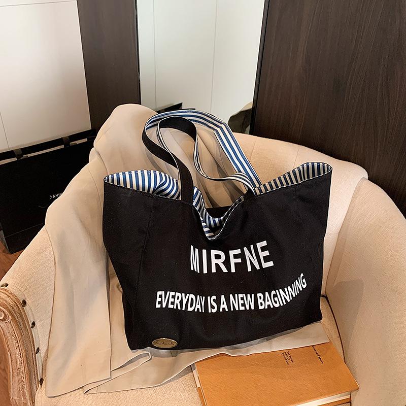 

Сумка-тоут большого размера с надписью, женская, новая модная, контрастного цвета, в полоску, летняя, простая, на плечо, подмышку чёрный