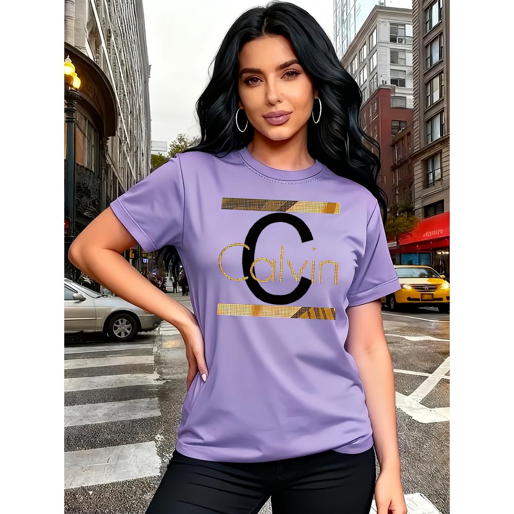 Calvin Brevtryck Dam T-shirt - Guld Grafik Grön Casual Topp