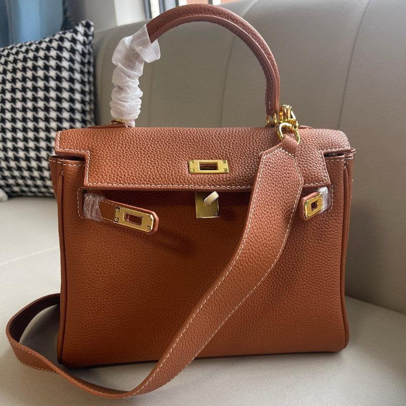 2026 nova bolsa de couro togo com alça larga para ombro, bolsa de mão de couro bovino de primeira camada, bolsa feminina original para ombro único e transversal
