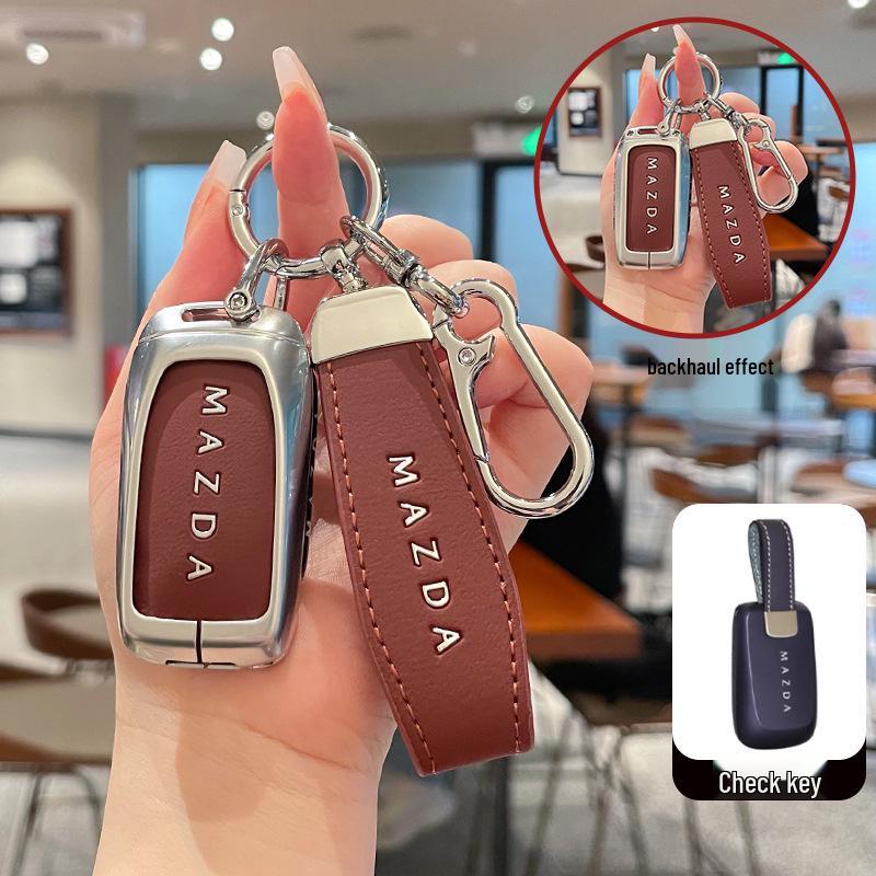 Kuooo: Wear-resistant, fully enclosed Mazda EZ6 key fob and EZ60 car remote protective cases with buckle.